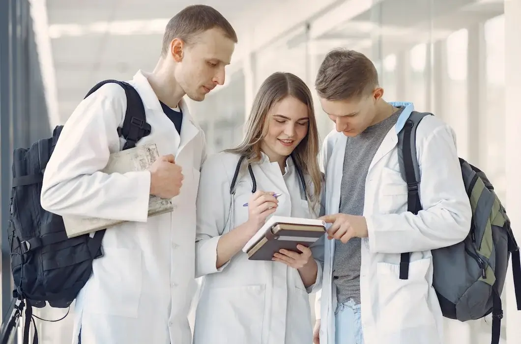 GOVERNMENT DELAYS PLANS TO DOUBLE MEDICAL STUDENTS IN ENGLAND?